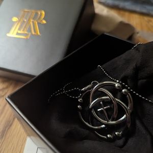 Lisa Robertson Perseverance Black intertwining cross and circle necklace